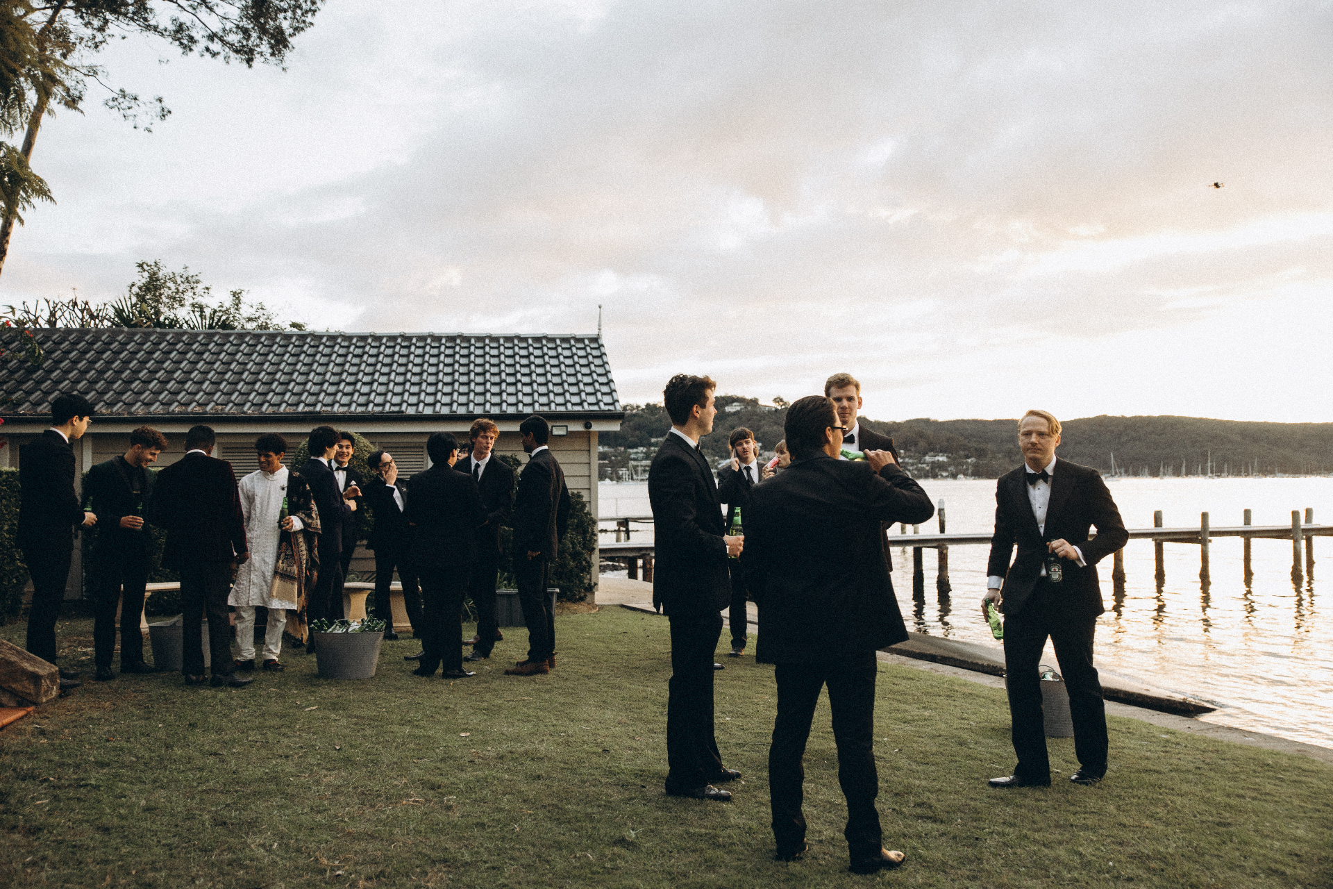 Four guests in black tie